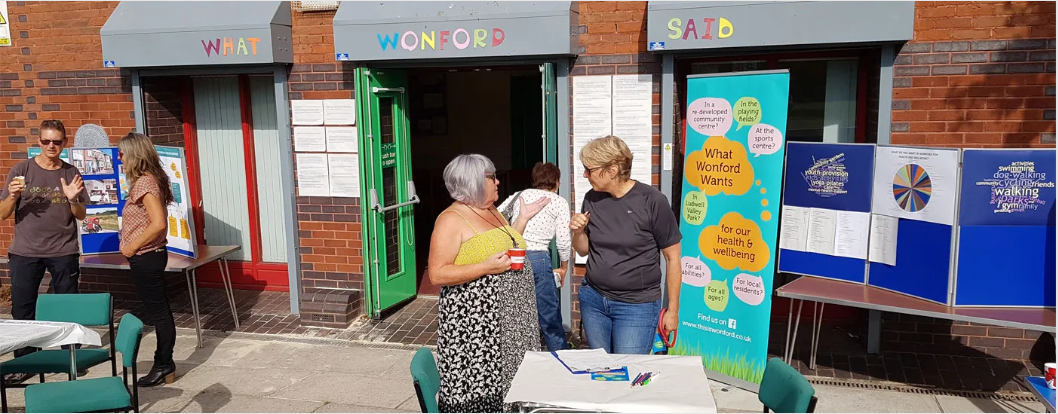 people talking at the feedback event